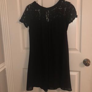 Back dress with lace.